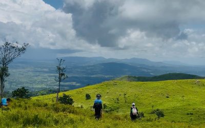 Travellers trekking across Pal Sol Grassland